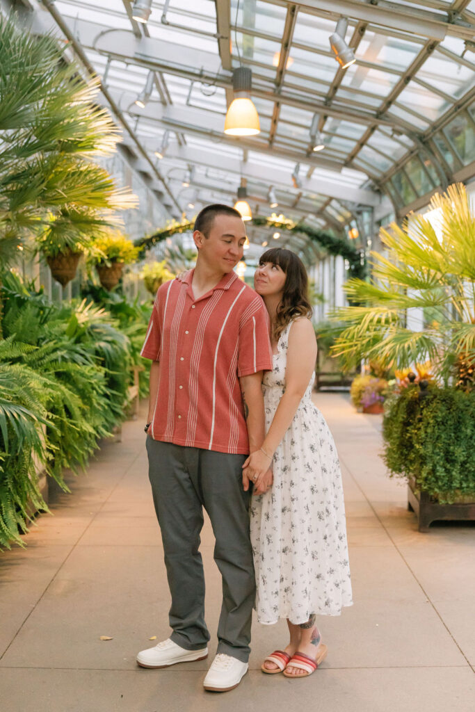 Enchanting greenhouse engagement photos in Denver