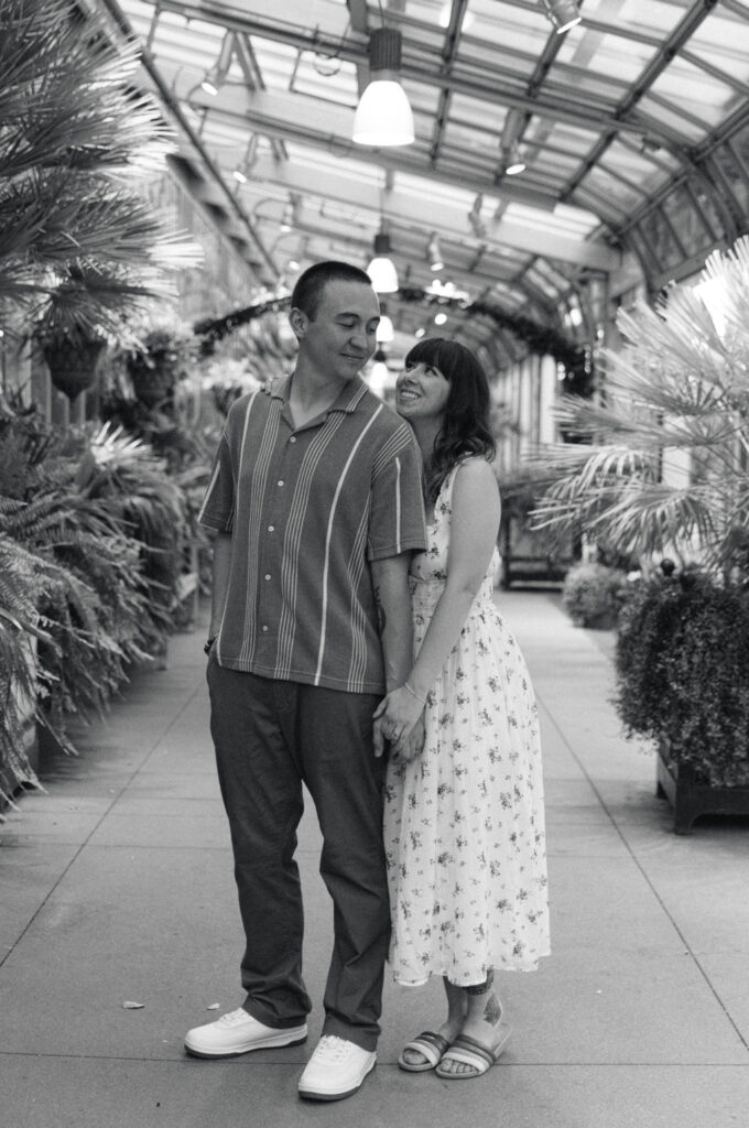 Enchanting greenhouse engagement photos in Denver