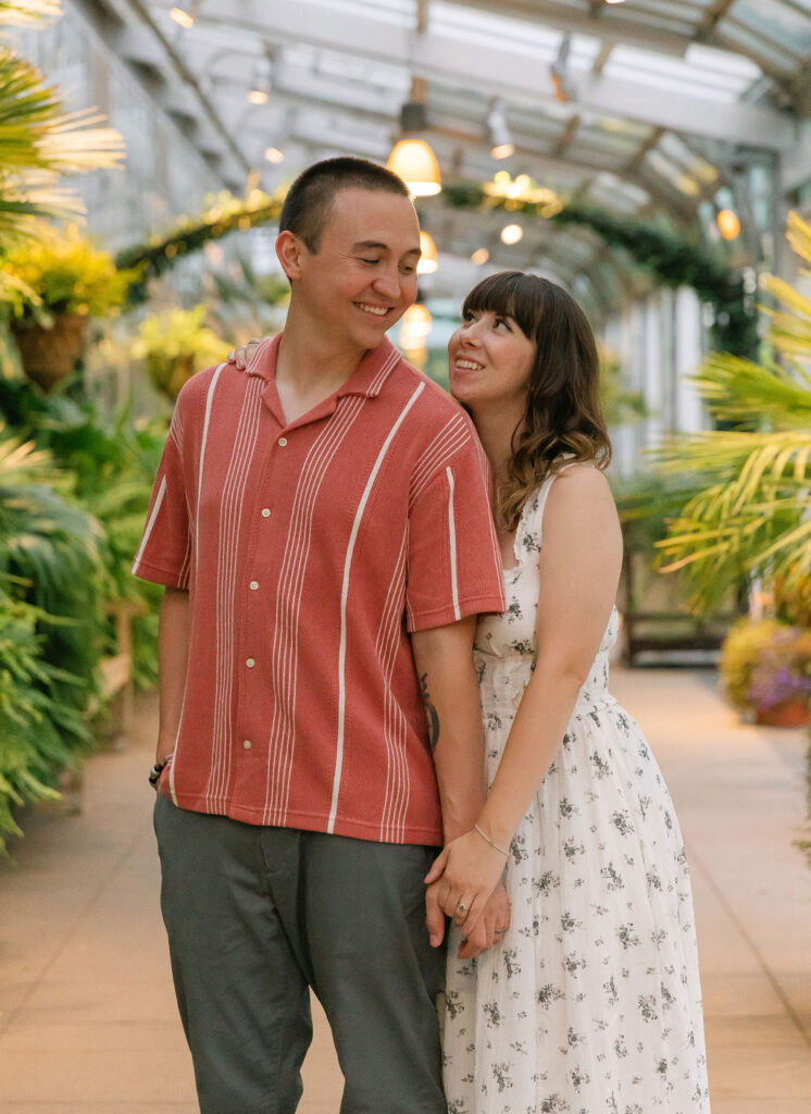 Enchanting greenhouse engagement photos in Denver