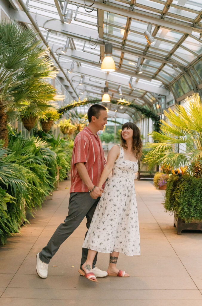 Enchanting greenhouse engagement photos in Denver