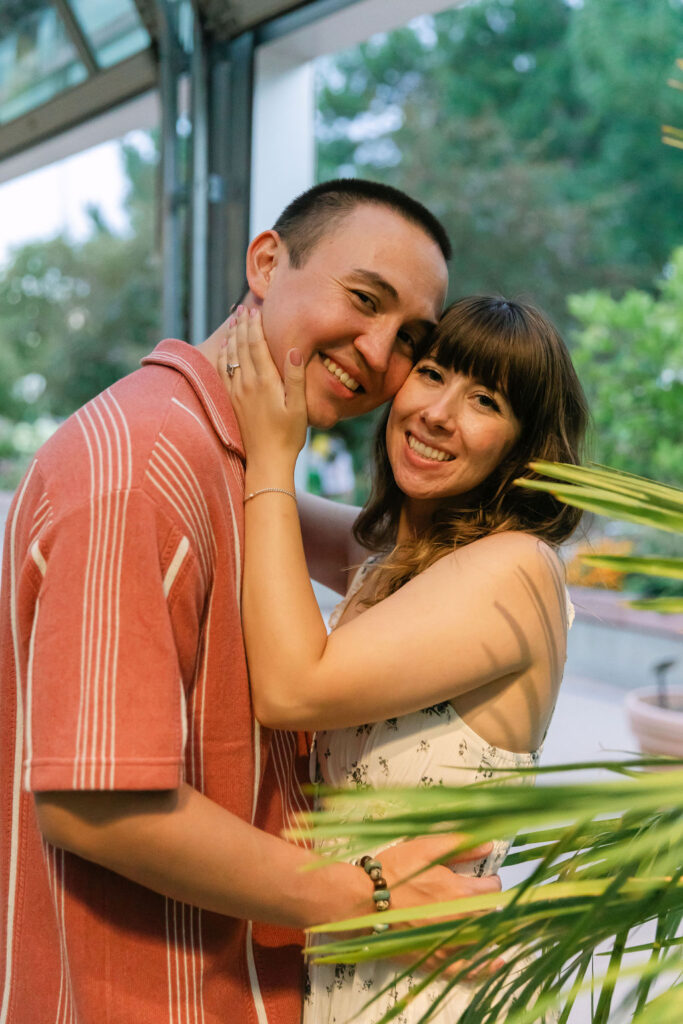 Enchanting greenhouse engagement photos in Denver