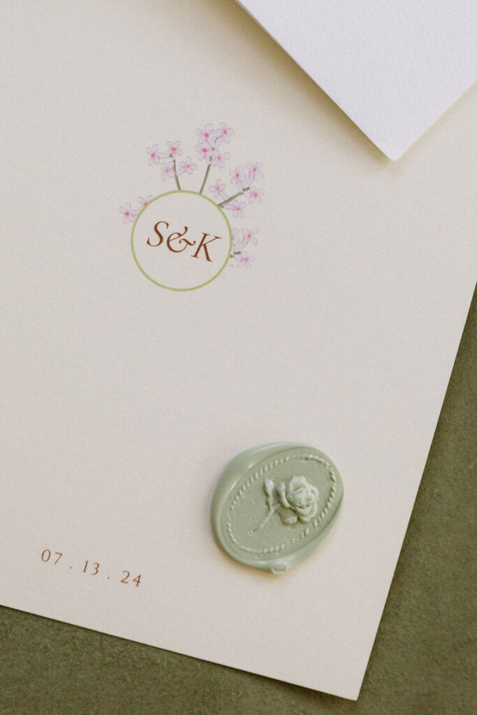 Eucalyptus green custom rose wedding stamp on a wildflower wedding invitation 