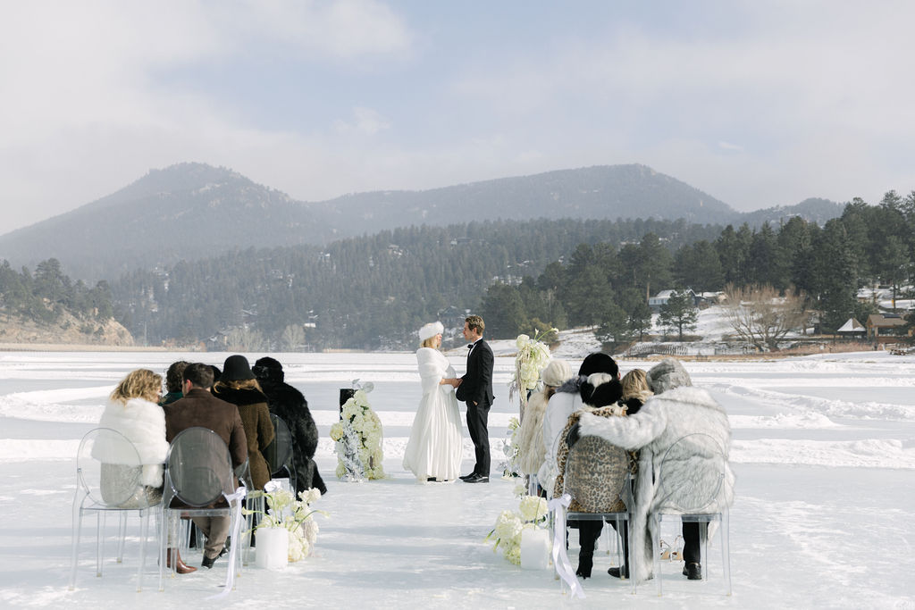 Winter mountain wedding on frozen Evergreen Lake in Colorado