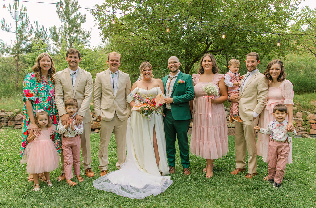 Gorgeous summer pastel wedding palette family photo at Stone Mountain Lodge in Lyons, Colorado.