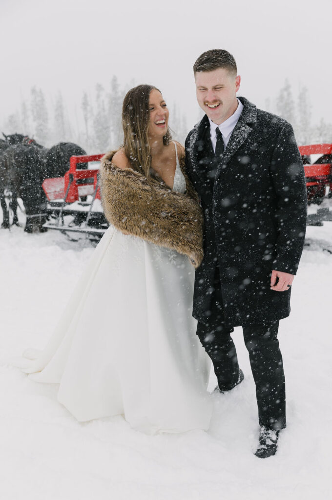 Winter sleigh ride elopement in Winter Park, Colorado at Dashing Thru The Snow