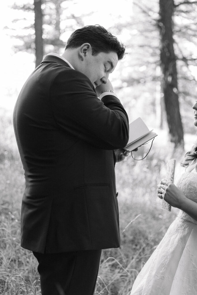 candid and emotional bride and groom exchanging private vows