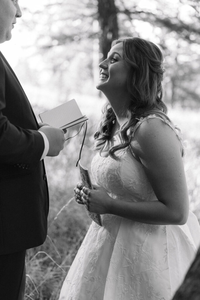 candid and emotional bride and groom exchanging private vows