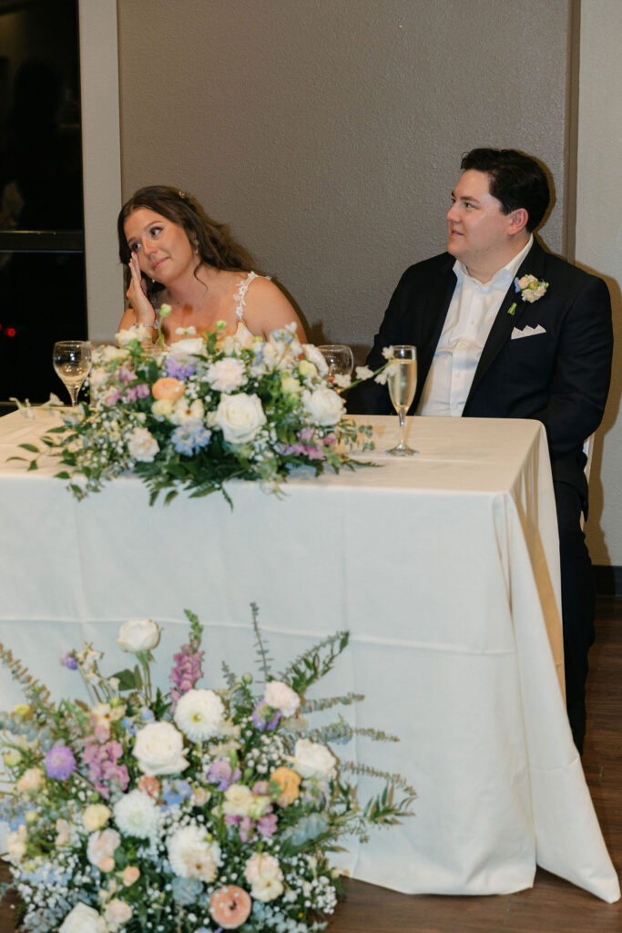 candid bride and groom reception toast moments