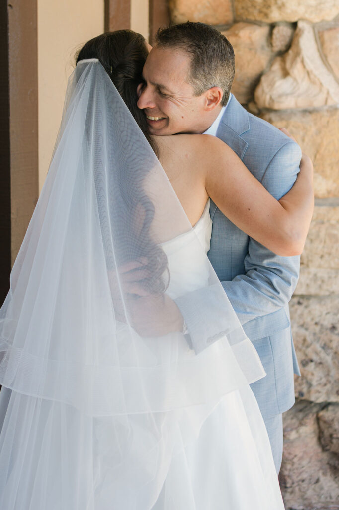Bride and dad emotional first look on wedding day