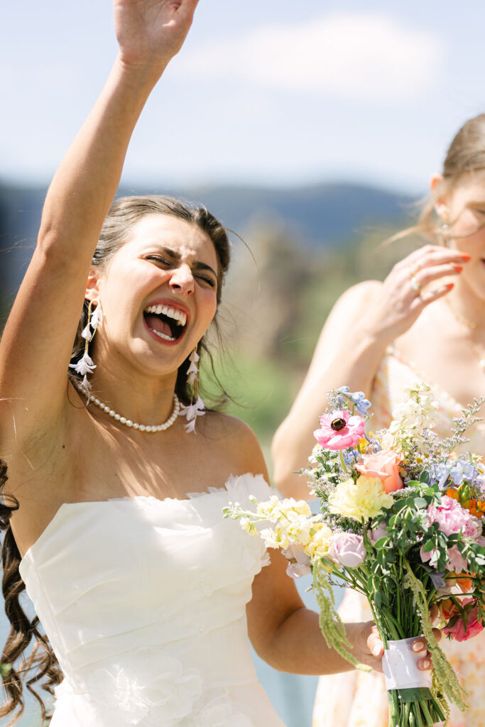 Park Country Club wedding photos showing joyful bride with wildflower bouquet