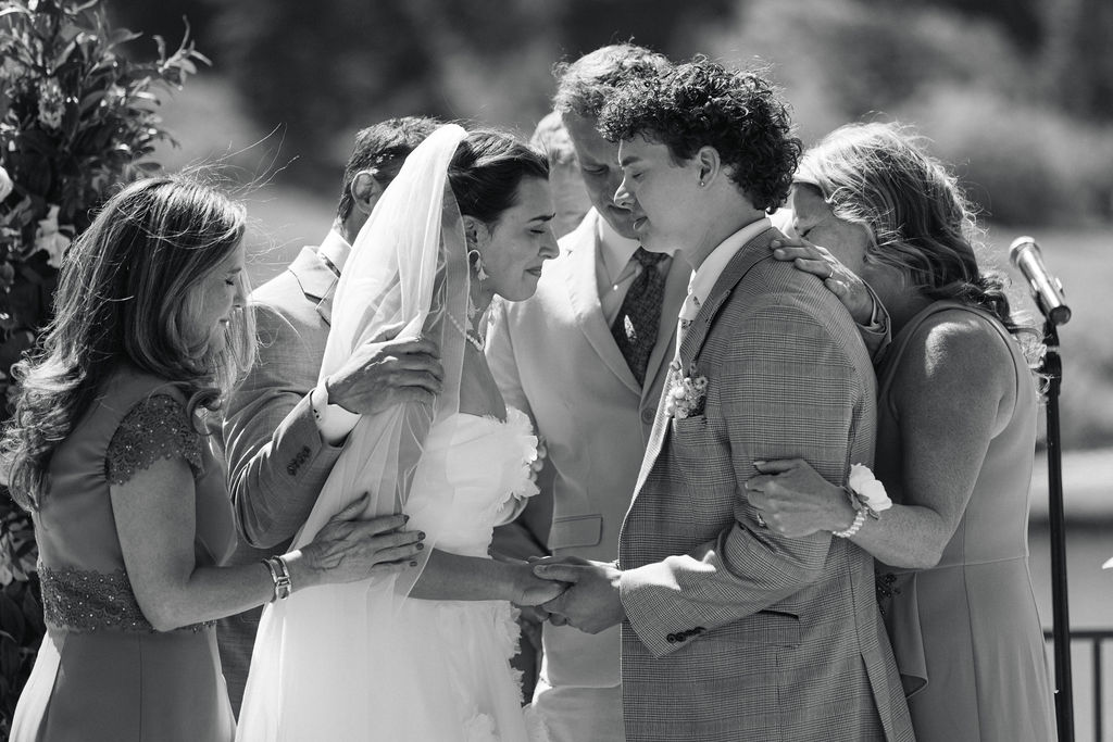 Intimate black and white wedding portrait of bride and groom during Colorado mountain wedding ceremony
