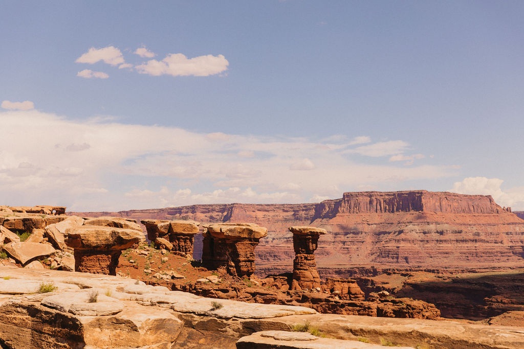 Red rock hoodoos and layered mesas at Canyonlands National Park near Moab, Utah—an epic natural backdrop for adventurous desert weddings and elopements at Moab wedding venues.