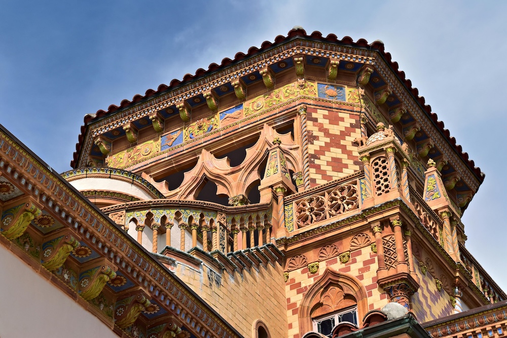 Architectural detail of Ca’ d’Zan mansion’s colorful mosaic tower at The Ringling Museum in Sarasota, perfect for couples seeking a unique Florida wedding backdrop.
