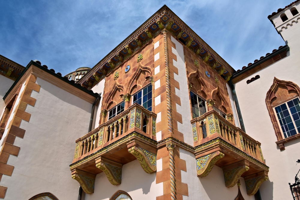 Ornate corner of the Ca’ d’Zan mansion at The Ringling Museum, featuring Venetian-style balconies and carved details that make it an iconic Florida wedding destination.
