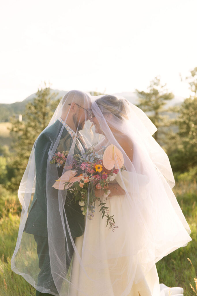 dreamy bride and groom portraits at the stunning landscapes near stone mountain lodge