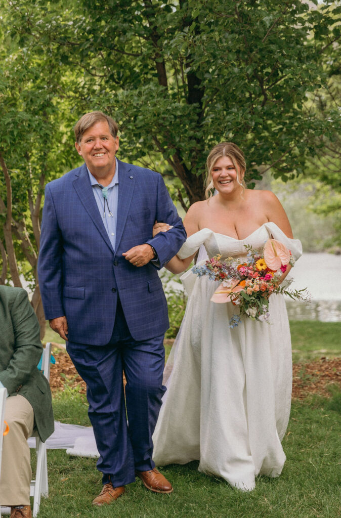 dad walking bride down the aisle