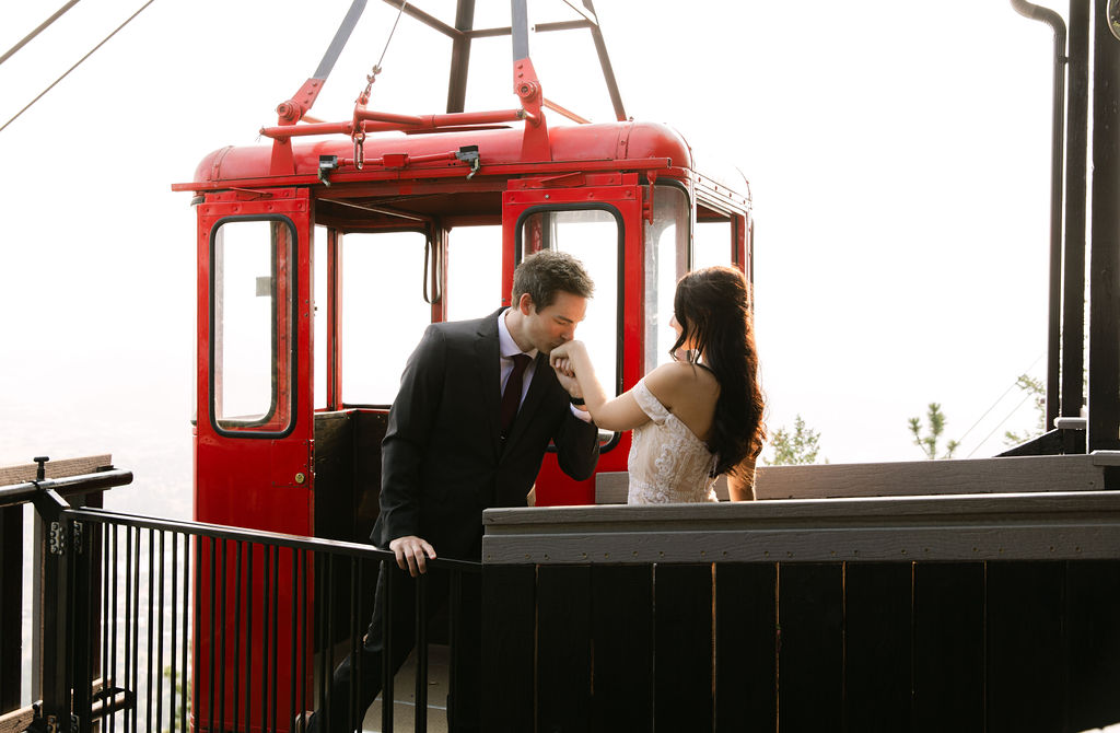 romantic bride and groom at Estes park aerial tram