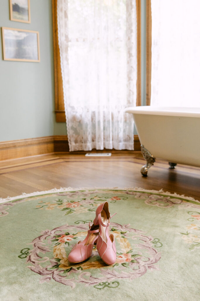 wedding shoes set up in a cozy vintage room