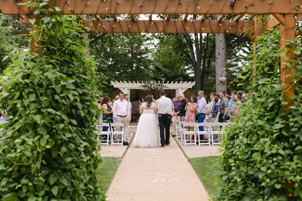 outdoor wedding ceremony at the tapestry house by wedgewood weddings