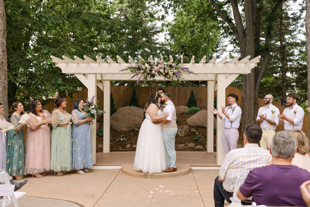 outdoor wedding ceremony at the tapestry house by wedgewood weddings
