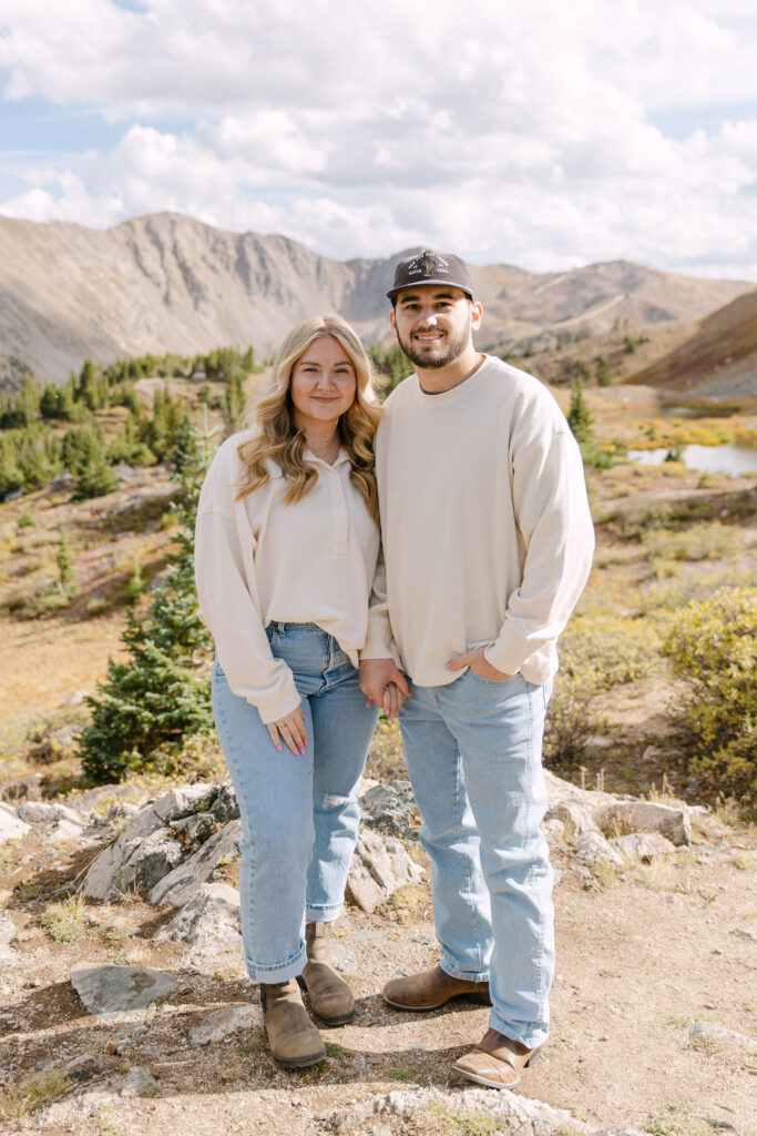 Casual mountain couple posing on Loveland Pass 