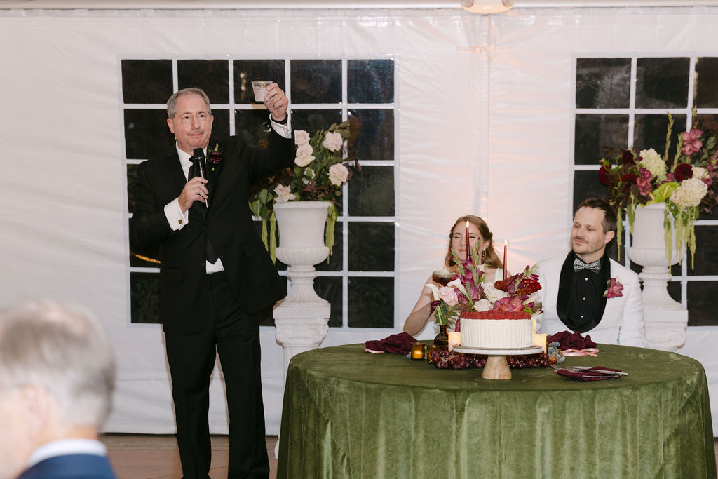 Father of the bride speaking during reception toasts at a luxury Colorado wedding.