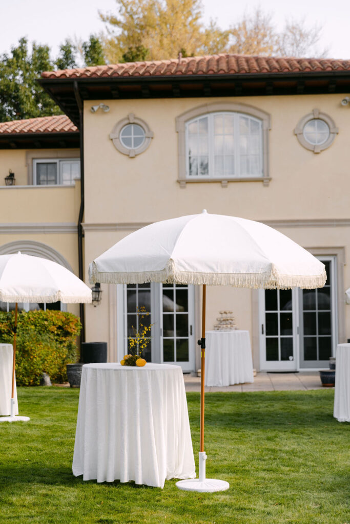 European-inspired outdoor cocktail hour setup at Oceana's Gardens wedding venue 