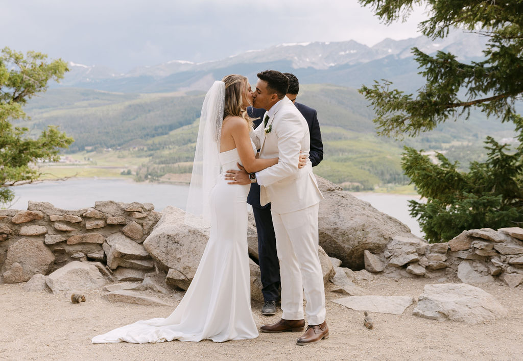 First kiss between the bride and groom at their Sapphire Point Overlook wedding