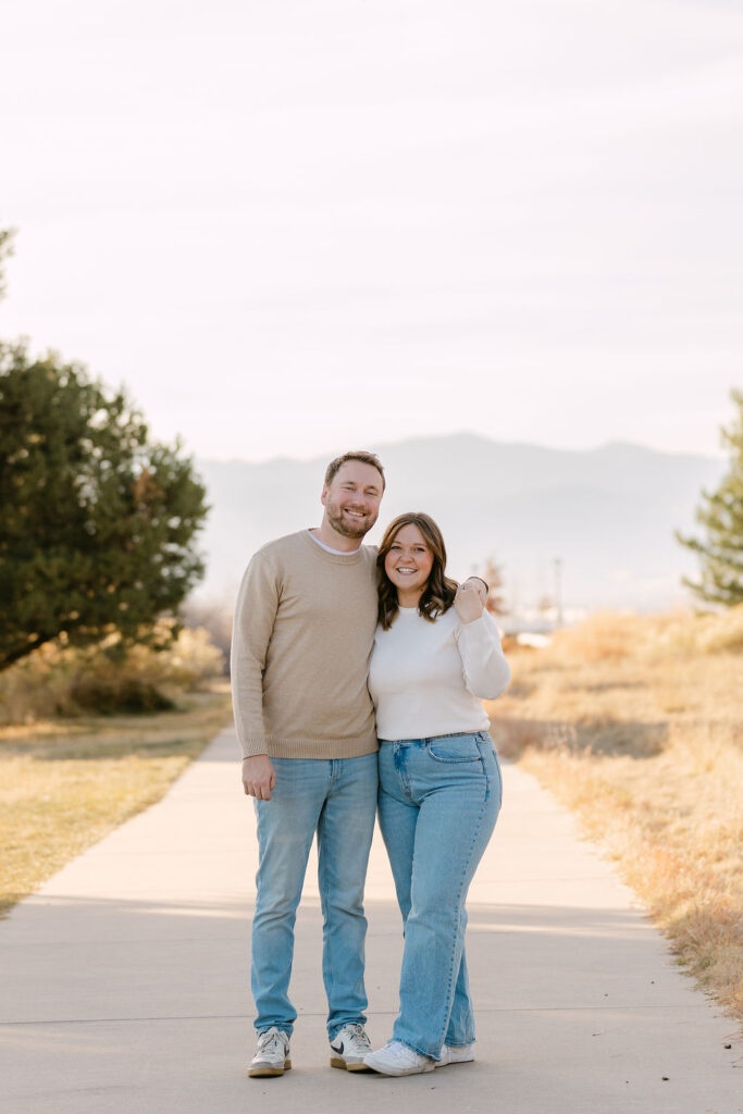 Couple standing on the path together during their Inspiration Point Park Denver engagement session