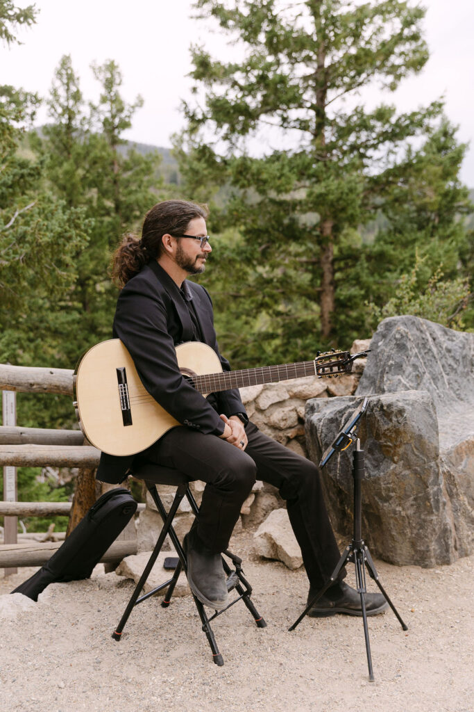 Live musician at a Sapphire Point overlook wedding ceremony