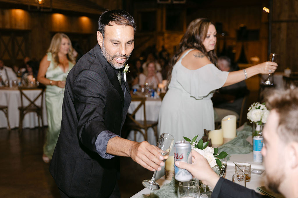 Guest giving a toast during reception at Spruce Mountain Ranch.