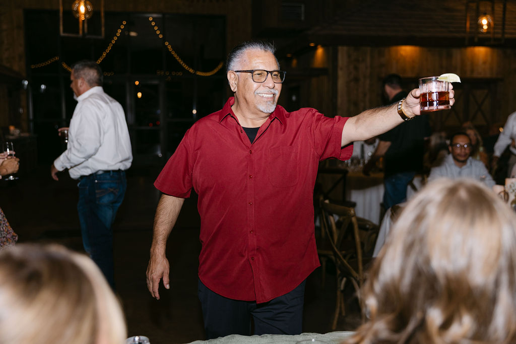 Wedding guests dancing and celebrating at Spruce Mountain Ranch.