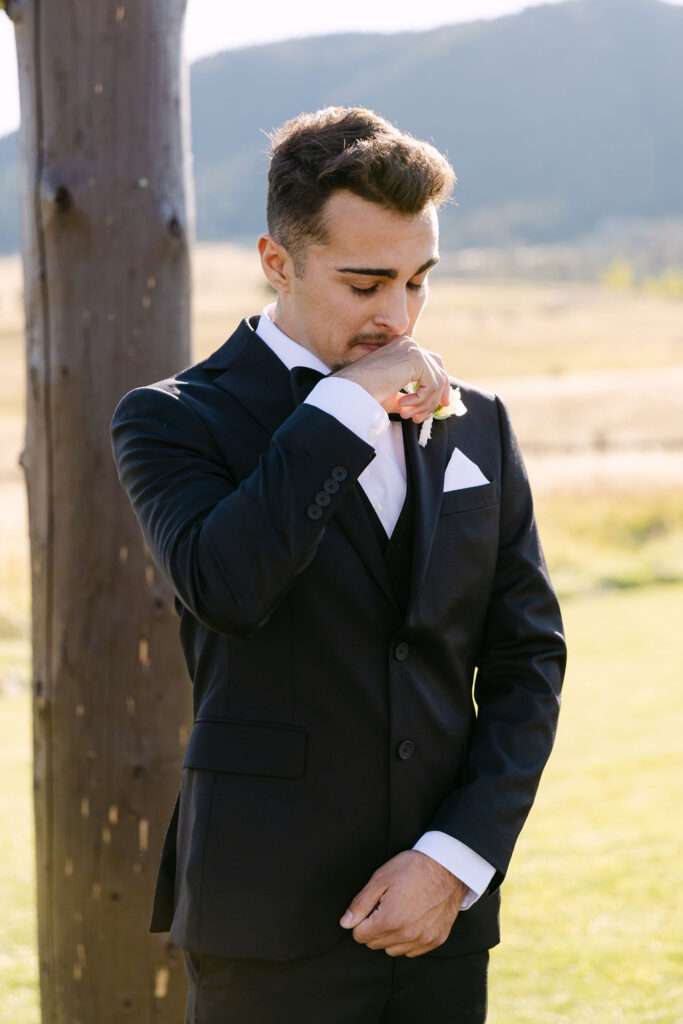 Groom becoming emotional as he sees the bride during the ceremony.