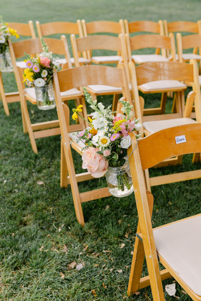 Pink and yellow ceremony florals and decor inspiration at the Lyons Farmette