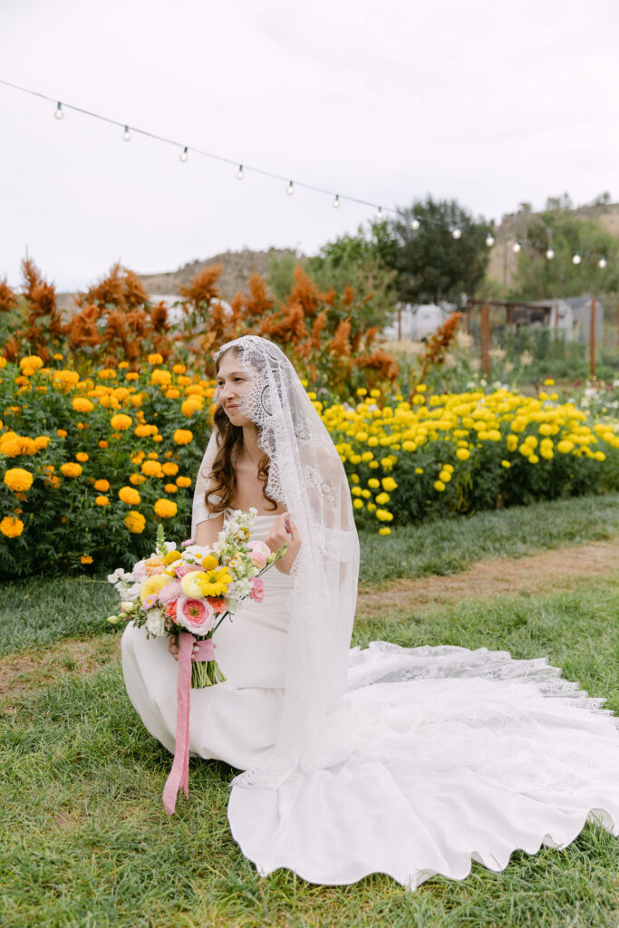 Lyons Farmette bridal portraits by Mrs. Ferree Photography at a colorado garden wedding venue with a long lace veil